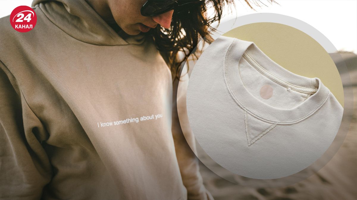 Що означає трикутник під коміром светра або світшота